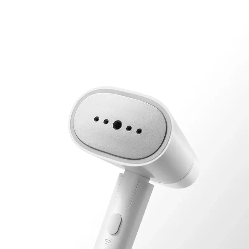 White handheld hair dryer on a white background